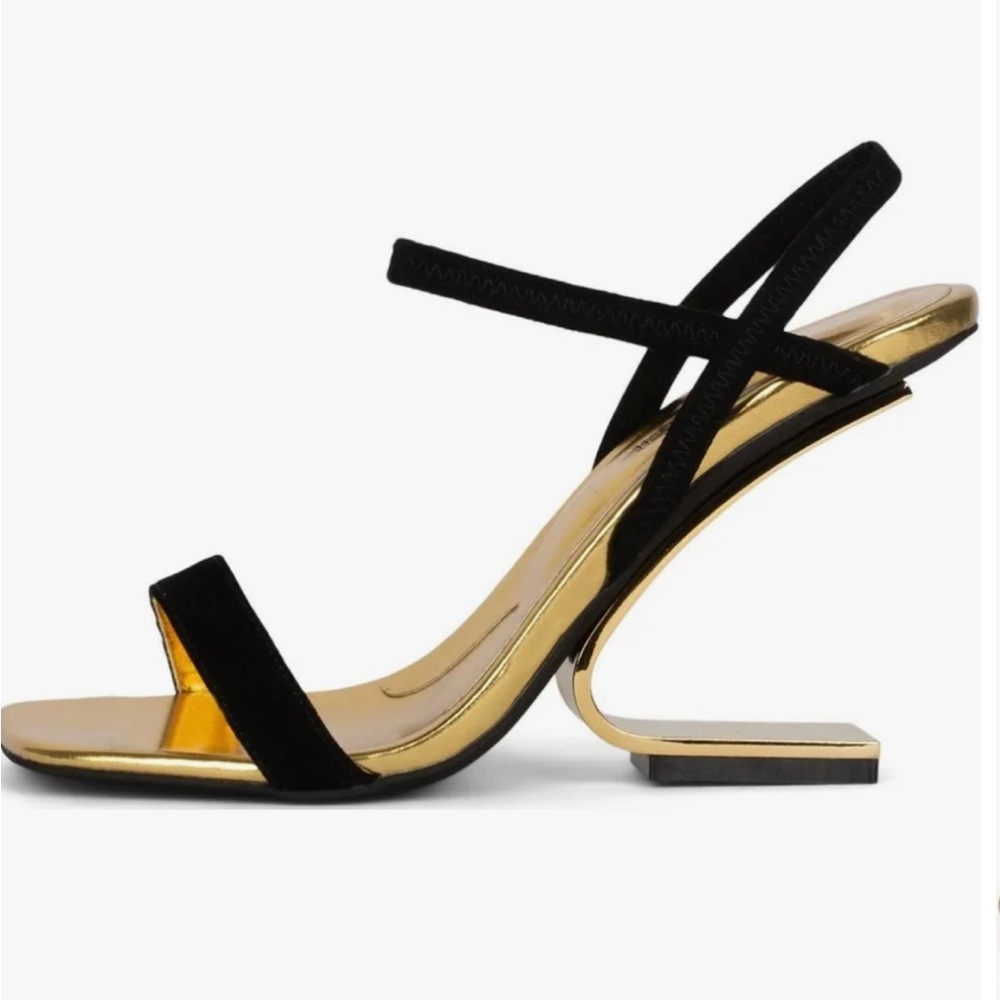 Used only once. Black and gold Jeffrey Campbell heels